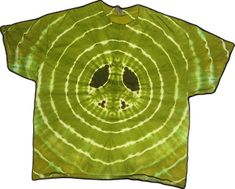 a green tie - dyed t - shirt with an image of a smiley face in the middle