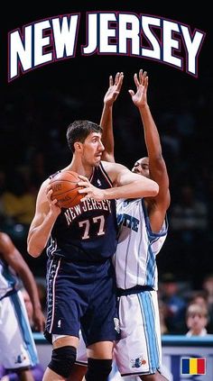 two basketball players are trying to block the ball