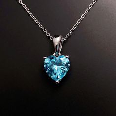 Solid Sterling Silver Blue Topaz December birthstone love heart pendant, with strong Sterling Silver chain. This December Birthstone necklace is the perfect birthday or Christmas gift. Matching earrings available here: https://www.etsy.com/listing/1352816205/ Available to order in gold, white gold, rose gold or platinum, please contact me for prices.  💎Pendant thickness: 6mm 💎Pendant width: 9mm 💎Pendant overall Length: 17mm 💎Chain length: 18 inch or other length if required.  ✨ For free give Sapphire Heart Necklaces For Anniversary, Heart Cut Heart Charm Jewelry For Birthday Gift, Sapphire Heart Necklace For Anniversary, Gift Heart Cut Gemstone Birthstone Necklace, Heart-shaped Sapphire Necklace For Anniversary, Heart Cut Gemstone Birthstone Necklace Gift, Heart Necklace With Gemstone For Gifts, Gemstone Heart Necklace As A Gift, Heart Cut Gemstone Necklace Gift