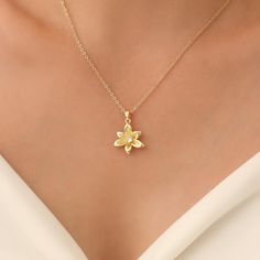 This elegant gold flower pendant necklace features a delicate,  design that adds a touch of sophistication to any outfit. Crafted from high-quality materials, it offers both beauty and durability, perfect for any occasion. Measurements: Pendant:21x18mm Chain: 14/16/18/20/22inch.All necklaces come with 2inch extender chain! All jewelry comes in a soft velvet pouch ready for gift. Materials: Gold over brass Quality promise Our jewelry is crafted with  attention to detail, offering both beauty and Necklace Flower, Floral Jewelry, Flower Pendant Necklace, Delicate Design, Velvet Pouch, Floral Jewellery, Gold Flower, Gold Flowers, Flower Pendant