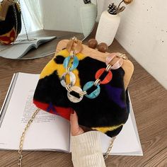 Brand Name: NatrugoShape: ShellHandbags Type: Shoulder BagsTypes of bags: Shoulder & Crossbody BagsOrigin: CN(Origin)Main Material: PolyesterClosure Type: HaspHardness: SOFTExterior: NoneStyle: FashionLining Material: PolyesterOccasion: partyGender: WOMENPattern Type: panelledNumber of Handles/Straps: SingleInterior: Cell Phone PocketDecoration: Chains Trendy Multicolor Evening Bag, Multicolor Rectangular Bags For Winter, Multicolor Rectangular Winter Bag, Winter Multicolor Rectangular Bags, Multicolor Crossbody Shoulder Bag For Party, Trendy Multicolor Crossbody Clutch, Trendy Multicolor Shoulder Bag For Party, Trendy Multicolor Shoulder Bag For Evening, Trendy Brown Evening Bag For Party