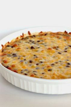 a cheesy casserole dish on a white plate