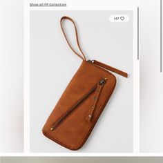 Free People Nwt Vegan Tan Leather Is Excellent Condition. Better Be Has Never Been Used. Has Grommets On Zipper Pull. Free Awesome Gift With Every Purchase. *Gift Value Based On Purchase Price Thank You For Looking Any Questions Please Ask Casual Everyday Clutch Wristlet, Casual Wristlet With Zipper Closure For Everyday Use, Casual Everyday Wristlet With Zipper Closure, Casual Wristlet With Zipper Closure, Trendy Brown Wristlet With Zipper Closure, Trendy Brown Wristlet For Everyday, Brown Wristlet With Zipper For Everyday Use, Brown Wristlet With Zipper Closure For Everyday, Everyday Brown Wristlet With Zipper Closure