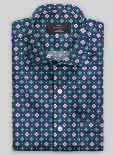 Step out in the vibrancy of the season with our Italian Angelo Summer Linen Shirt. Crafted from a premium blend of cotton and linen, adorned with a playful array of floral bursts in shades of green, white, and subtle reds against a deep blue backdrop, this shirt is a celebration of summer's lively palette.  With its easy charm and stylish flair, it’s a must-have for those who want to make a statement for both daytime adventures and evening festivities.  Click 'Customize Now' to modify the look if needed.   Pamper yourself, get this shirt made exclusively for you now! Multicolor Floral Print Shirt With Spread Collar, Green Printed Shirt With Spread Collar, Floral Print Cotton Shirt, Green Fitted Printed Shirt, Green Printed Top With Spread Collar, Fitted Green Printed Shirt, Green Cotton Shirt With Floral Print, Green Spread Collar Shirt For Spring, Summer Linen Shirt