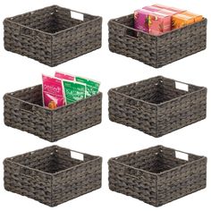 four baskets with different types of items in them and one has a box on the bottom