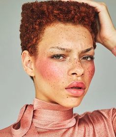 a woman with freckles on her face is shown in the instagramt