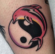 a tattoo with a yin sign on it