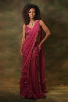 Pink pre-draped saree featuring mirrorwork embroidered border and ruffle detail. Comes with matching padded mirrorwork blouse. - Aza Fashions Pink Sequin Saree, Reception Outfits, Saree Georgette, Draped Saree, Stitched Saree, Simple Saree Designs, Desi Outfits, Sequin Saree, Ruffle Saree