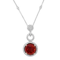 This Glamorous Juleve Inspired 18 Karat White Gold Necklace features a Spectacular 4.80 Carat Cabochon Natural Fire Opal. The Gorgeous Opal is accompanied by 0.95 Carat Total Weight Round Diamonds in the Drop Halo & Diamonds by the Yard Chain. The Necklace is 18 inches in length. This One of a Kind Piece was Designed and Proudly Manufactured in U.S.A. Diamond By The Yard, Diamonds By The Yard, Custom Diamond Rings, Halo Necklace, Solitaire Rings, High Jewellery, White Gold Necklace, Pendant Diamond, Fancy Necklace