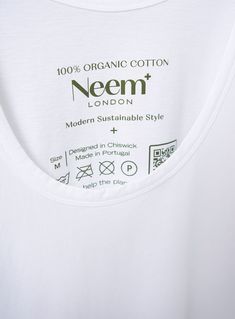 An organic under layer for all year dressing, Made from 100% organic cotton. Super soft, regular body fit and is perfect for wearing under our shirts and ZQ Merino knitwear. Featuring soft narrow binding on the stopped neck and armholes that are shaped for comfort, this is a traditional style brought up to date. Here at Neem, we love a vest, providing a comfortable and soft layer all year. Fitted Basic Organic Cotton Top, Fitted Basic Top In Organic Cotton, Organic Relaxed Fit Crew Neck Tops, Seamless Snug Fit Cotton Tops, Cotton Scoop Neck T-shirt For Layering, Snug Fit Seamless Cotton Tops, Cotton Scoop Neck Layering T-shirt, Spring Organic Cotton Stretch Tops, Organic White Crew Neck Tops