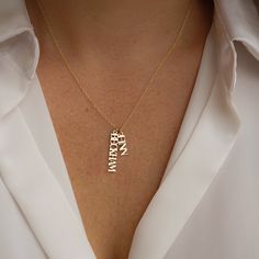 The London Name Necklace is the perfect accessory to express your unique style! Inspired by the classic style of London, this necklace features one customizable name pendant, and if you're feeling extra fun, you can add more! Add a special date, your initials, your favorite word - the possibilities are endless. NECKLACE FEATURES Choice of: 18k gold plating over sterling silver or Sterling Silver handcrafted custom name pendant (measures approx. 1") Choice of Chain Metal: Gold Filled or Sterling Pendant With Names, Name Brand Jewelry, Special Necklace Unique, Custom Necklace Names, Personalized Necklace Names, Name Pendant Gold, Best Necklace, Date Necklace, Names Necklace