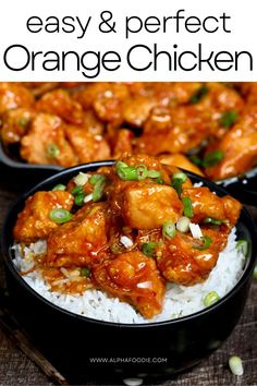 orange chicken with white rice and green onions in a black bowl