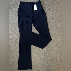 Navy Blue Express Flared, Dress Pants. Size 2 Long. Great Condition. Never Worn. Tag Still Attached. Elegant Stretch Navy Pants, Navy Fitted Bottoms For Office, Navy Fitted Dress Pants For Work, Blue Elastane Dress Pants With Pockets, Fitted Navy Straight Dress Pants, Navy Fitted Elastane Pants, Blue Straight Elastane Dress Pants, Navy Full-length Dress Pants For Work, Chic Navy Fitted Pants