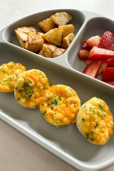 two trays filled with different types of food