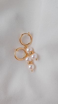 Hypoallergenic Pearl Huggie Hoop Earrings, White Pearl Huggie Earrings With Pearl Charm, White Hypoallergenic Pearl Earrings In 14k Gold, Hypoallergenic Pearl White Dangle Earrings, Hypoallergenic Pearl White Dangle Pearl Earrings, Hypoallergenic White Pearl Earrings In 14k Gold, Dainty Huggie Pearl Earrings With Charm, Dainty Dangle Huggie Earrings With Pearl Charm, Dainty Huggie Earrings With Dangle Pearl Charm