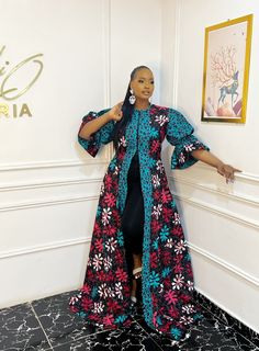 Blue Long Sleeve Ankara Dress, Fitted Blue Ankara Maxi Dress, Black Ankara Fabric Maxi Dress, Long Sleeve Ankara Maxi Dress For Parties, Black Long Sleeve Dress In Ankara Fabric, Long Sleeve Ankara Fabric Spring Dress, Spring Ankara Long Sleeve Dress, Spring Long Sleeve Ankara Dress, Spring Ankara Maxi Dress