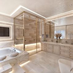 a large bathroom with marble floors and walls