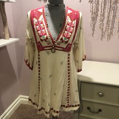 Nwot Free People Embroidered Dress. Ornate Embroidery By Neckline. Bell Sleeves. Shorter Fit. Can Be Used As A Top For A Taller Person. Summer V-neck Embroidered Dress For Festive Occasions, Traditional V-neck Boho Dress For Spring, Bohemian Embroidered Fitted V-neck Dress, V-neck Dress With Intricate Multicolor Embroidery, Festive V-neck Dress With Embroidered Neckline, Embroidered V-neck Bohemian Dress, Folk Style V-neck Dress With Embroidered Hem, Traditional V-neck Embroidered Dress, Spring V-neck Tunic With Embroidered Neckline