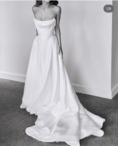 black and white photo of woman in wedding dress