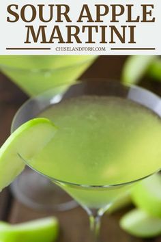 an apple martini is garnished with sliced apples