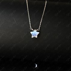 star moonstone pendant White Moonstone Clavicle Chain Necklace, Sterling Silver Star Necklace With Gemstone, Silver Star Of David Necklace With Gemstone, White Star-shaped Jewelry With Moon Charm, Silver Moonstone Charm Necklace As Gift, Silver Celestial Moonstone Necklace, Celestial Silver Moonstone Necklace, Silver Moonstone Charm Necklace For Gift, Delicate Silver Opal Necklace