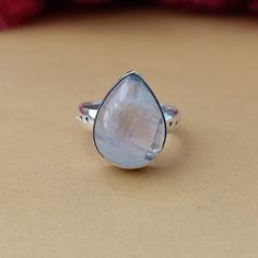 Handmade moonstone bohemian ring , you can wear this ring as a party wear ring .. Title - Moonstone ring Stone color - White Stone shape - Oval Material - Sterling silver 925 Note - This is natural stone so shade may be little bit different .. we are giving you best quality rings on best price .. contact us for more quantity Minimalist Silver Moonstone Ring With Natural Stones, Minimalist Silver Moonstone Ring, Silver Teardrop Moonstone Ring, Bohemian Moonstone Ring In Sterling Silver, Bohemian White Moonstone Ring With Natural Stones, Bohemian Silver Moonstone Promise Ring, Bohemian Moonstone Ring With Moon Phase Detail, Bohemian Silver Moonstone Ring, Bohemian Moonstone Crystal Ring With Gemstone