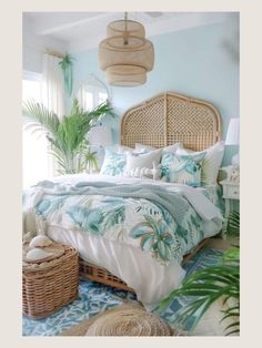 a bedroom decorated in blue and white with wicker headboard, rattan bedspread, palm tree pillows, and woven baskets on the floor