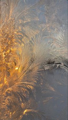 an image of frosted glass with gold lights on the top and bottom part, as seen from above