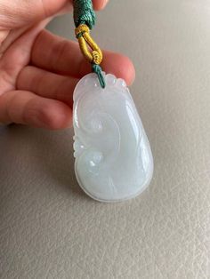 🌈 Lucky Ruyi Jadeite Jade Pendant, Necklace, Icy Light Green 🌷 Untreated Natural Jadeite/ Grade A Jade/ Certified 🌷 Jade from Myanmar/ Burma 🌷 100% handmade carving 🌷 Dimensions : 50.7 x 30.8 x 5.4 mm 🌷 Color : Icy Light Green 🌷 Free standard shipping from Hong Kong with tracking included 🌷 Take approximately 7-21 days to arrive worldwide ❤️ In Chinese Culture: Young people wear jade pendant will have a prosperous life, attracts good luck and friendship Old people wear jade pendant will White Jade Amulet Jewelry, Traditional White Jade Necklaces, White Oval Jade Jewelry, Oval White Jade Jewelry, White Carved Jade Jewelry, Carved White Jade Jewelry, Jade Charm, Jade Pendant Necklace, Lavender Green