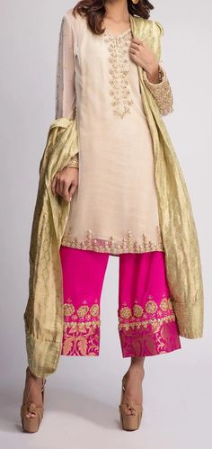 Color: Beige / Hot Pink/ gold Shirt: Chiffon  Pants: Silk  Duppata: Golden lama tissue  Embroidery: Golden Tilla , Pearls , Sequins and Tikki stones Gold Raw Silk Unstitched Suit For Reception, Gold Salwar Kameez For Reception With Straight Kurta, Eid Dupatta With Gold Embroidery In Georgette, Unstitched Gold Embroidered Georgette Dupatta, Unstitched Georgette Dupatta With Gold Embroidery, Festive Anarkali Unstitched Suit With Gold Embroidery, Traditional Gold Palazzo Set With Gold Embroidery, Eid Salwar Kameez With Gold Embroidery In Georgette, Gold Embroidered Unstitched Suit For Wedding