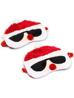 two red and white sleeping masks with santa's hat on them, one is wearing sunglasses