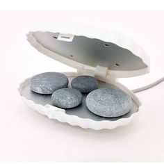 A Royal Massage exclusive! Our portable clamshell hot stone heat plate provides up to 10 stone capacity, rapid heating times, “cool outer wall touch” technology and compact convenience to provide a truly holistic hot stone experience. This heater is perfect for heating stones for massage, manicures, pedicures and facials or when smaller volumes are needed. 120V (50W) High quality heater designed specifically for heating massage stones Suitable for up to 10 small stones or 4 large stones Cool Touch outer Clam Shell for improved handling No water needed. Double steel heating elements provide quick, instantaneous heat Heats rocks to 122 degrees Fahrenheit (50 degrees Celsius) Lightweight and portable makes it easy to heat stones in about 10 minutes Outside dimensions are 8.25" x 5.7" x 3" BON Hot Rocks, Cream Pumps, Massage Stones, Romantic Gifts For Him, Massage Equipment, Hot Stone Massage, Stone Massage, Professional Massage, Hot Stones