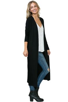 Bring a dash of style to breezy days with this Long Sleeve Solid Maxi Cardigan from Iconic Luxe. Tailored in a regular fit with a length that hits at the knees, this long-sleeve cardigan is crafted from a lightweight fabric for a cozy feel. Designed in a solid hue, you can layer the cardigan over tops or dresses for versatile styling options. 95% Rayon, 5% Spandex Made in the USA Pull On closure Features: open front, long sleeves, midi length, lightweight fabric Suit for: work, casual, everyday wear, date night, movie night, brunch, farmers market, vacation, traveling, beach, barbeque party, coffee date, school Season: spring, summer, fall, winter Model is 5’7” and wearing size Small. Hand wash cold. Do not bleach. Hang to dry. Casual Long Solid Cardigan, Casual Open Front Sweater Coat For Work, Casual Long Coat Style Cardigan, Casual Long Sweater Coat, Summer Solid Color Long Sleeve Cardigan, Solid Long Sleeve Summer Cardigan, Summer Workwear Cardigan With Long Sleeves, Chic Solid Long Coat Cardigan, Full Length Fall Outerwear