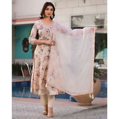 Cream colored suit is prettified with floral printed work on neck as shown which makes it appear classy. This top is made of mulmul cotton fabric which is accompanied with pure cotton bottom and organza dupatta. Women can buy this suit to wear for their parties, festive, functions and events. Note:- The actual product may differ slightly in color and design from the one illustrated in the images when compared with computer or mobile screen. Size Chart Size: Semi Stitched/Unstitched can be altere Anarkali Cotton Salwar Kameez With Sheer Dupatta, Cotton Anarkali Set With Sheer Dupatta For Eid, Summer Cotton Silk Anarkali Set, Cotton Unstitched Suit With Sheer Dupatta For Diwali, Diwali Cotton Unstitched Suit With Sheer Dupatta, Cotton Salwar Kameez With Sheer Dupatta For Eid, Cotton Lawn Suit With Sheer Dupatta In Saree Style, Bollywood Style Cotton Unstitched Suit With Printed Border, Bollywood Cotton Unstitched Suit With Printed Border