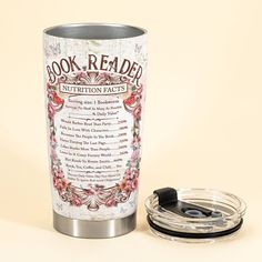 a book reader is next to a travel mug