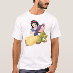 a man wearing a t - shirt with an image of snow and prince on it