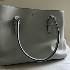 Brand New Kat Spade Bag Comes With 2 Zipper Pockets Inside Off Bag. Beautiful Grey Color With Kate Spade Logo On Outside Of Handbag Elegant Shoulder Bag With Leather Handles For Errands, Kate Spade Everyday Satchel With Double Handle, Kate Spade Double Handle Satchel For Everyday, Modern Kate Spade Shoulder Bag With Leather Handles, Modern Kate Spade Bags For Everyday Use, Modern Kate Spade Bags For Errands, Kate Spade Tote Shoulder Bag, Kate Spade Everyday Top Handle Shoulder Bag, Kate Spade Satchel Shoulder Bag For Daily Use