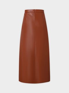 The Leather A-Line Skirt-Cognac is a versatile addition to any wardrobe. The A-line silhouette flatters all body types while the cognac color adds a touch of sophistication. Chic Brown Flared Skirt, Chic Brown Midi Skirt, Chic Brown Relaxed Skirt, Brown A-line Bottoms For Work, Chic Brown A-line Bottoms, Brown Leather Lined Skirt Bottoms, Classic Brown Lined Skirt Bottoms, Chic Brown A-line Skirt, Brown A-line Skirt For Workwear