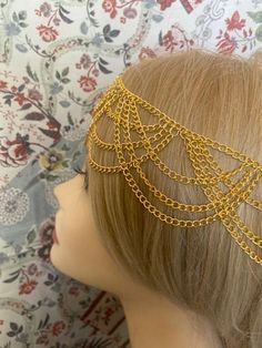 ♥ Six Feathers Studio♥ Art Deco style flapper headband made of goldtone metal chains. Many beautiful drapes through front and sides. Adjustable chain with two lobster clasps in back. Statement piece! Great for a wedding, art deco party, Downton Abbey, Gatsby, or 20s style event! :) I ship both US and International. This unique item is being sold as is with no returns and no exchanges so look at the pictures and ask questions before you bid. I am available to answer any questions and do get back Gold Band Jewelry For Parties, Gold Headband For Party, Gold Art Deco Jewelry For Party, Elegant Adjustable Gold Body Jewelry, Adjustable Gold Body Jewelry For Wedding, Adjustable Metal Headpieces For Parties, Adjustable Metal Party Headpieces, Gold Gatsby Headpiece For Party, Adjustable Metal Headpieces For Party