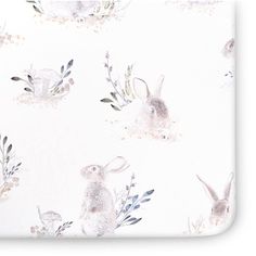 an image of a rabbit pattern on a white wallpaper with flowers and leaves in the background