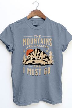 The Mountains are Calling, Outdoor, Retro Vintage Wash Heavy Weighted Unisex Graphic Top.Outdoor, Camping, Hiking, Mountain, Sunrise, Sunset, Offroad.Our vintage Heavy Weighted tee COMFORT COLOR is perfect for a Vintage Garment Dye look. It is made with ring-spun cotton and features a vintage wash, giving it a streetwear vibe. Thanks to our garment-dyeing process, each piece has a unique vintage look, but please keep in mind that there may be slight color variations between garments due to the nature of the pigment dye.6.1 oz / Softer garment dyed fabricMade In: Designed in USAFabric Contents: 100% Airlume combed and ring-spun cotton Cotton T-shirt With Funny Print For Outdoor Activities, Outdoor Cotton T-shirt With Funny Print, Cotton T-shirt With Funny Print For Outdoor, Cotton Tops With Funny Print For Outdoor Activities, Cotton Top With Funny Print For Outdoor Activities, Blue Cotton T-shirt For Outdoor Activities, Blue Cotton Tops For Outdoor Activities, Spring Cotton Tops For Outdoor Activities, Cotton Tops For Outdoor Spring Activities