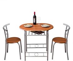 a table with two chairs and a wine bottle