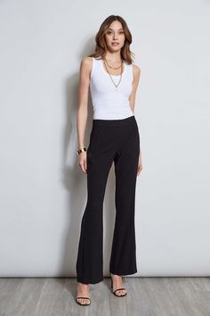 We chose our favorite Fluid Crepe for the season's must have pant. Incredibly flattering with a fit & flare leg - these pants are detailed with a partially lined lace insert down the sides for a glimpse of leg. Get ready for the compliments. Elie Tahari Exclusive Fit & Flare Fluid Crepe Pant with Lace Side Stripes 70% Triacetate, 30% Polyester Runs true to size. Model is 5'9" and wearing size 2 Measurements: 10"L front rise 33.5"L inseam (approx. length for a size 6) Dry Clean Only Imported Styl Flare Pant, Woven Handbags, Lace Side, Elie Tahari, Leather Weaving, Lace Insert, Side Stripe, Flare Pants, Fit & Flare