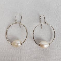 See last photo for length or size measurements, compare our measurements to something in your jewelry box to know if this piece will work for you. ❤Please check out my other listings❤   ️I'm available for questions 📫 All orders are shipped within 24 hours Mon-Fri ✨Fashion is our armor, dress well and face the world confident✨ Everyday Hoop Pearl Earrings With Ear Wire, Everyday Pearl Hoop Earrings With Ear Wire, Classic Silver Hoop Pearl Earrings, Everyday Sterling Silver Pearl Earrings, Classic Handmade Teardrop Hoop Earrings, Sterling Silver Hoop Pearl Earrings, Nickel-free Classic Dangle Hoop Earrings, Nickel-free Sterling Silver Pearl Earrings For Everyday, Classic Sterling Silver Hoop Pearl Earrings