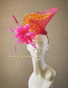 Structured, chic crisscross woven material on this asymmetrical, hand-sculpted showpiece. Plumes of hand-cut feather-bursts give this motion and drama. AVAILABLE IN VARIOUS COLORS; please inquire and I'll be glad to assist. Easy-to-wear headband fascinator makes a statement, and can be worn to a myriad of events: Easter, Bridal, Derby-Wear, Del Mar Races, Hat Contests, church, galas, Kentucky Derby, Kentucky Oaks, Melbourne Cup, high tea, cocktail parties, weddings, and more.  Some customizing available; please message with your requests to see if we can meet your needs. Other colors available; please inquire before purchase if you need another.  *FREE SHIPPING  For more STATEMENT JEWELRY and HANDMADE HATS go to www.aimeesfuller.com Aimee Fuller has been a trusted online seller since 1999, Royal Ascot Hats, Derby Fascinator, Bridal Fascinator, Ladies Who Lunch, Easter Hats, Melbourne Cup, Kentucky Derby Hats, Kentucky Derby Hat, Derby Day