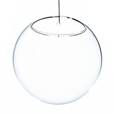 a clear glass ball hanging from a string