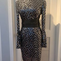 Beautiful Calvin Klein Knee Length Sheath Dress. Dress Is Size 6 With Some Stretch. New Without Tags, Never Worn. Perfect For Upcoming Holidays And Other Special Occasions. Metallic Long Sleeve Sequin Dress For Night Out, Metallic Long Sleeve Dress For Night Out, Silver Fitted Long Sleeve Sequin Dress, Fitted Silver Sequin Dress, Fitted Long Sleeve Silver Sequin Dress, Elegant Fitted Silver Midi Dress, Silver Chic Fitted Sequin Dress, Fitted Metallic Midi Dress For Party Season, Silver Long Sleeve Sequin Dress For Night Out