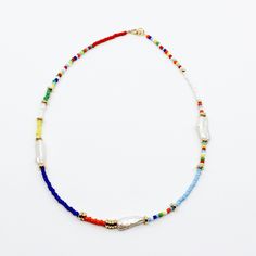 Sorrento Necklace I MCHARMS Trendy Multicolor Beaded Necklaces, Luxury Pearl Beaded Necklace With Colorful Beads, Cheap Colorful Beads Long Necklace, Bohemian Pearl Beaded Necklaces With Spacer Beads, Gold Pearl Necklace With Colorful Beads, Multicolor Heishi Beads With Gold Details, Beach Pearl Necklace With Colorful Beads In Gold, Bohemian Gold Pearl Necklace With Colorful Beads, Gold Pearl Necklace With Colorful Beads For Beach