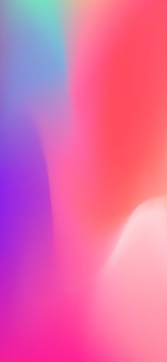 an abstract blurry background with pink and blue colors