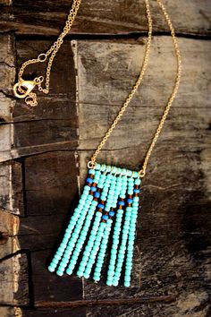 Turquoise Chevron Bead Necklace Turquoise Beaded Dangle Necklaces With Tiny Beads, Blue Dangle Beaded Necklace With Tiny Beads, Turquoise Beaded Dangle Necklaces, Bohemian Turquoise Beaded Necklace With Gold Beads, Turquoise Dangle Beaded Necklaces With Tiny Beads, Turquoise Beaded Chain Necklace With Dangle, Long Blue Beaded Turquoise Necklace, Elegant Hand-strung Turquoise Beaded Necklaces, Rustic Hand-strung Turquoise Beaded Necklaces